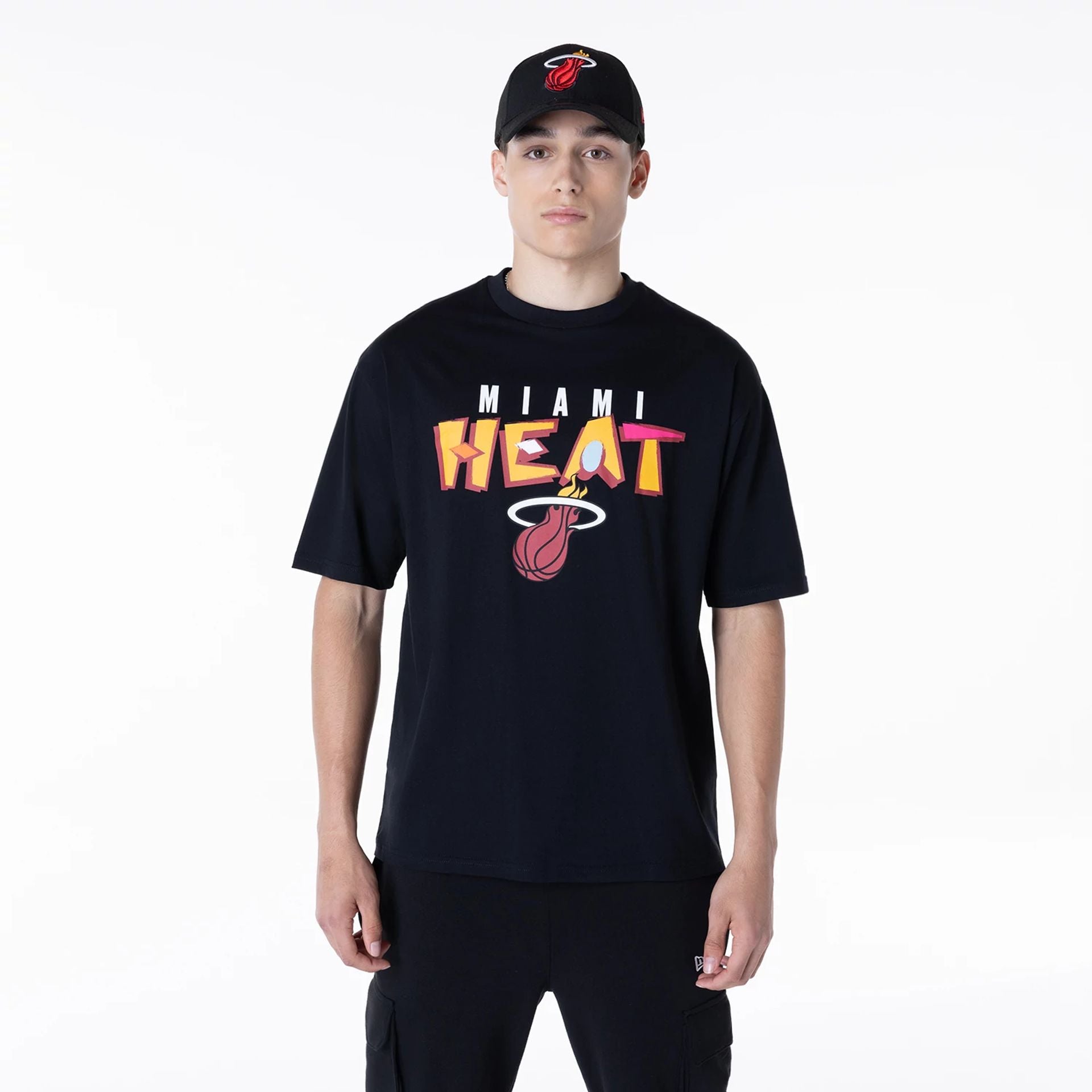 The Male model is wearing Miami Heat NBA Graphic Black Oversized T-Shirt 1