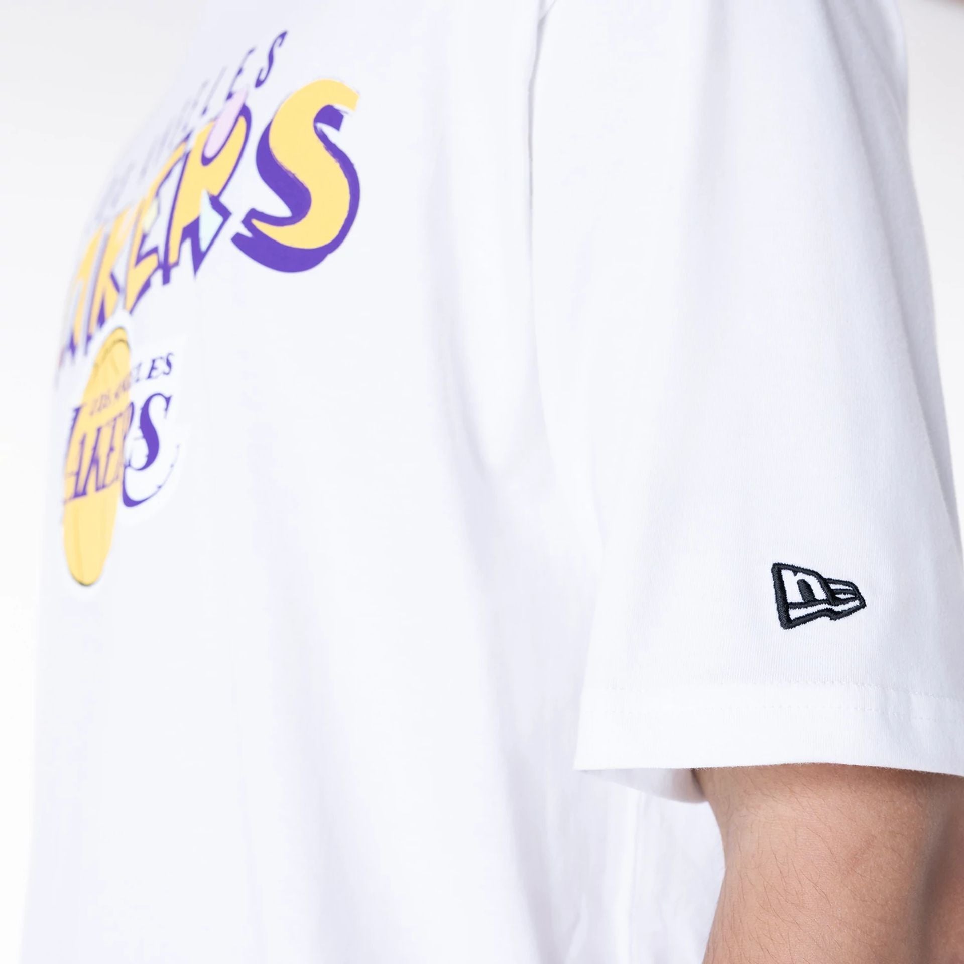 The Male model is wearing LA Lakers NBA Graphic White Oversized T-Shirt 6