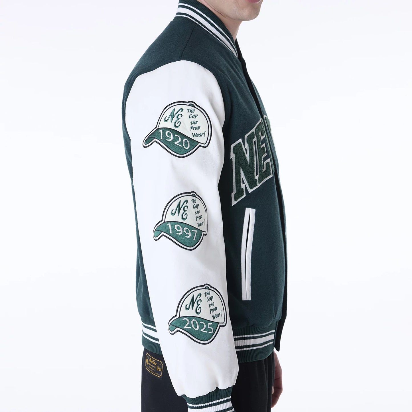 The Male model is wearing New Era Patch Dark Green Varsity Jacket 4