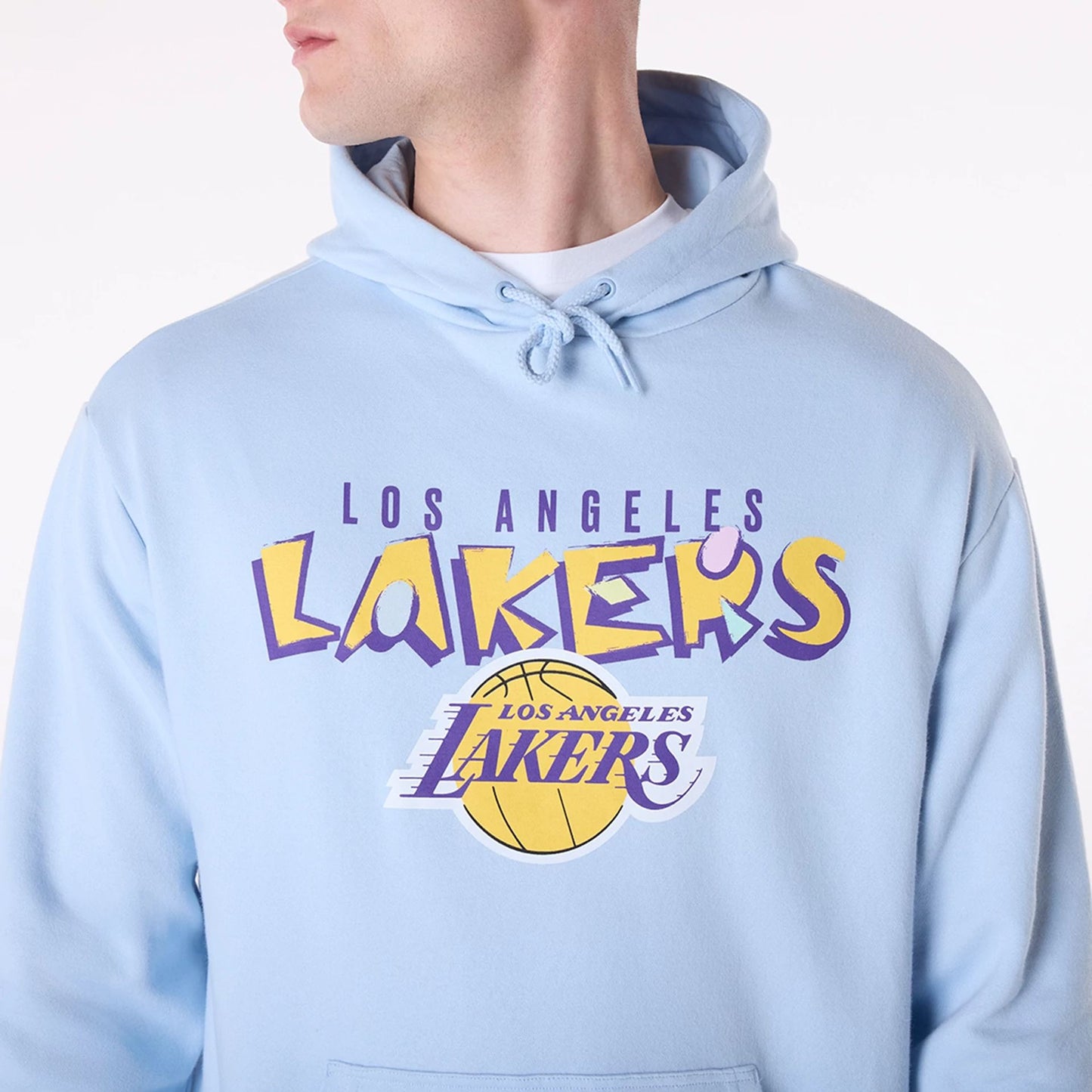 The Male model is wearing LA Lakers NBA Graphic Pastel Blue Oversized Pullover Hoodie 3