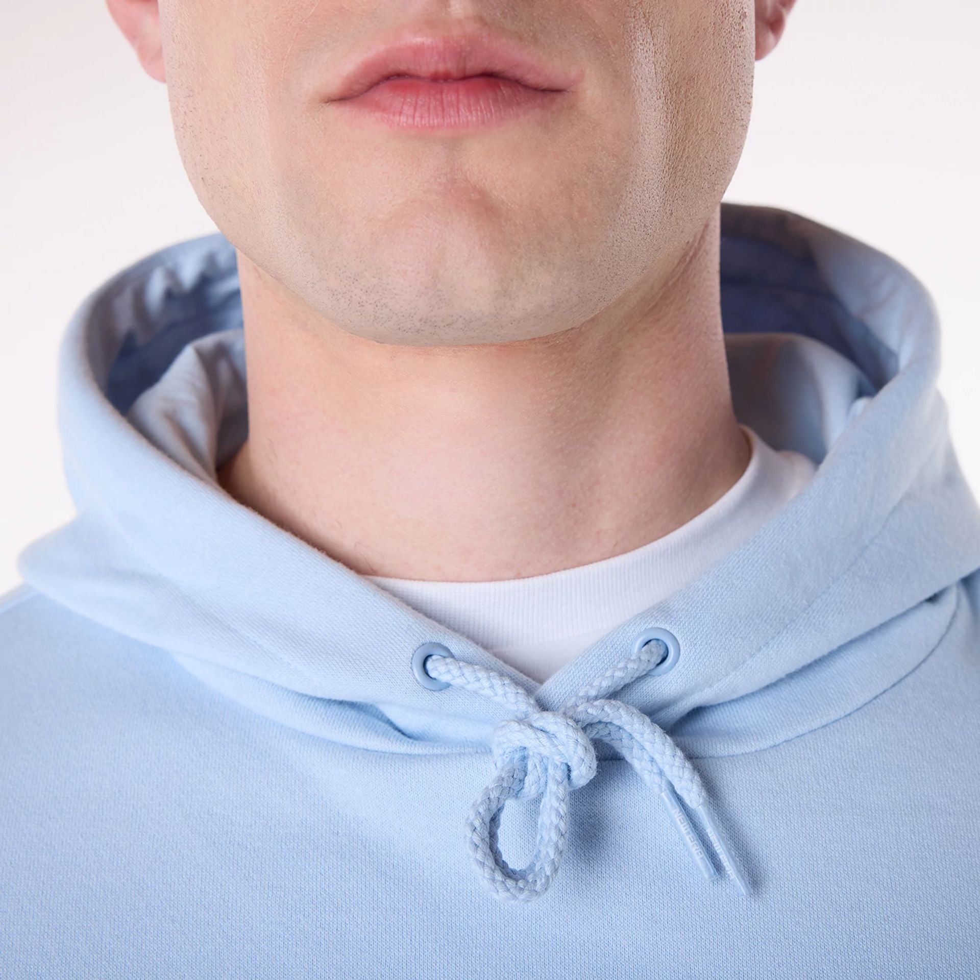 The Male model is wearing LA Lakers NBA Graphic Pastel Blue Oversized Pullover Hoodie 6