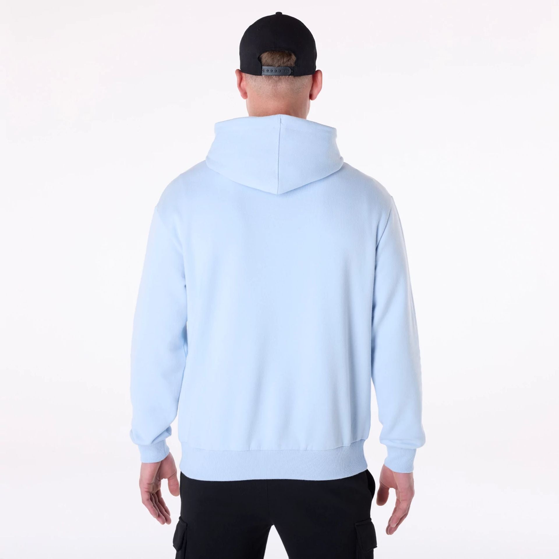 The Male model is wearing LA Lakers NBA Graphic Pastel Blue Oversized Pullover Hoodie 2