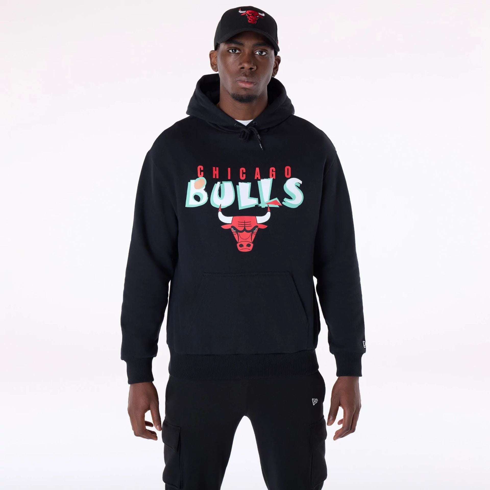 The Male model is wearing Chicago Bulls NBA Graphic Black Oversized Pullover Hoodie 1