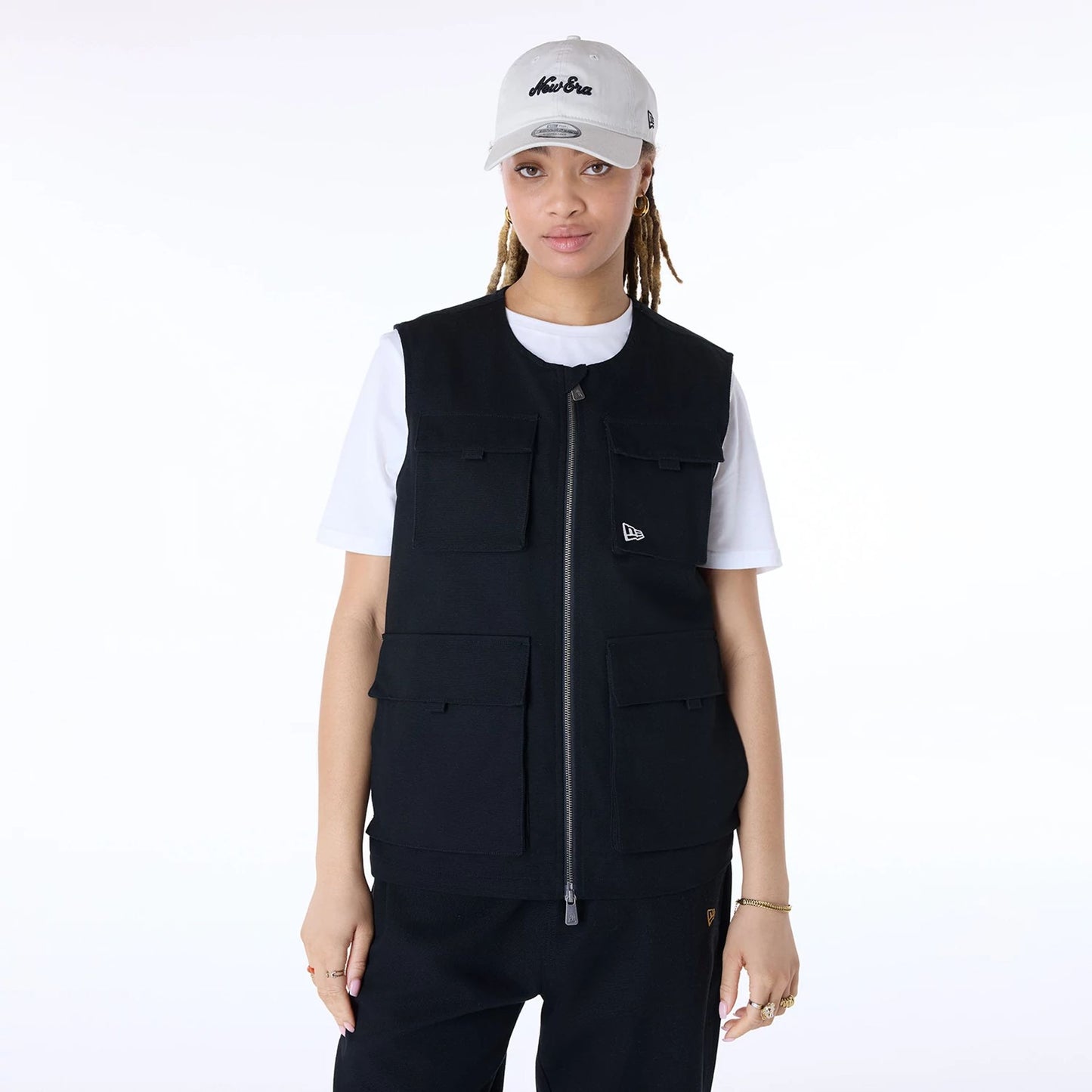 The Male model is wearing New Era Essential Black Utility Vest 4