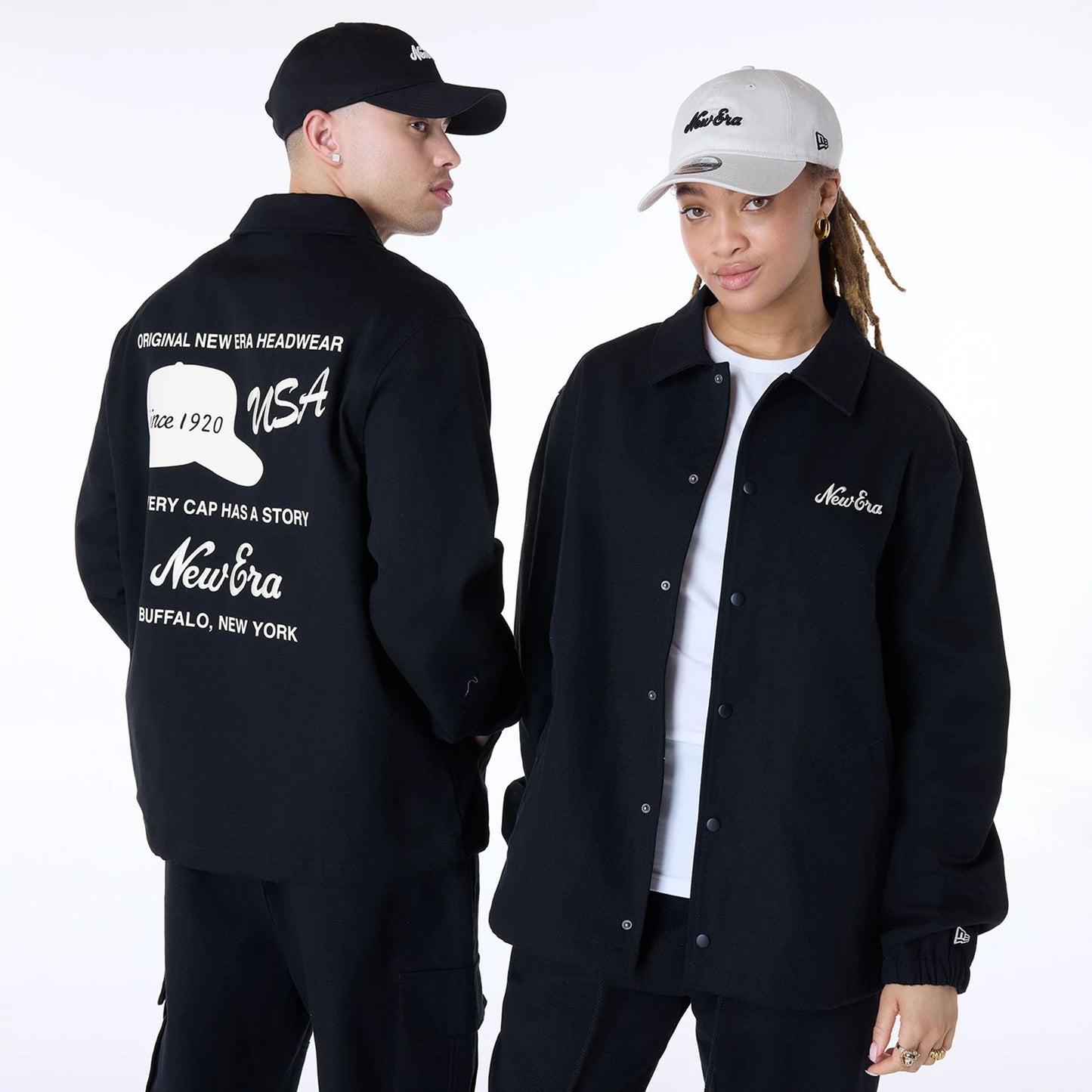 The Male model is wearing New Era Essential Black Coaches Jacket 1