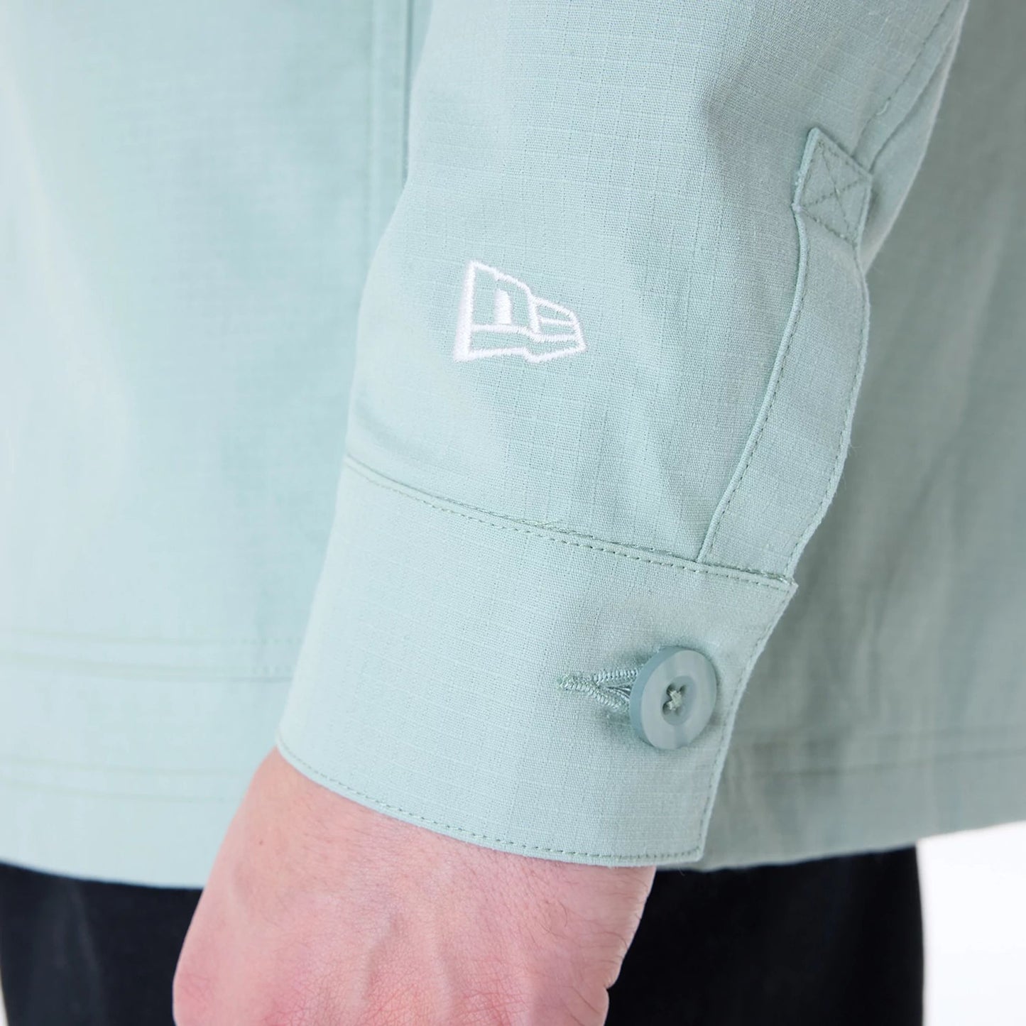 The Male model is wearing New Era Essential Pastel Green Shacket 8