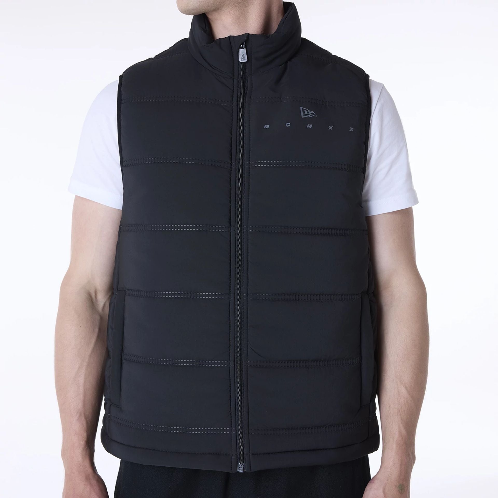 The Male model is wearing New Era Essential Black Padded Gilet 6