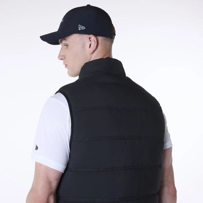 The Male model is wearing New Era Essential Black Padded Gilet 7