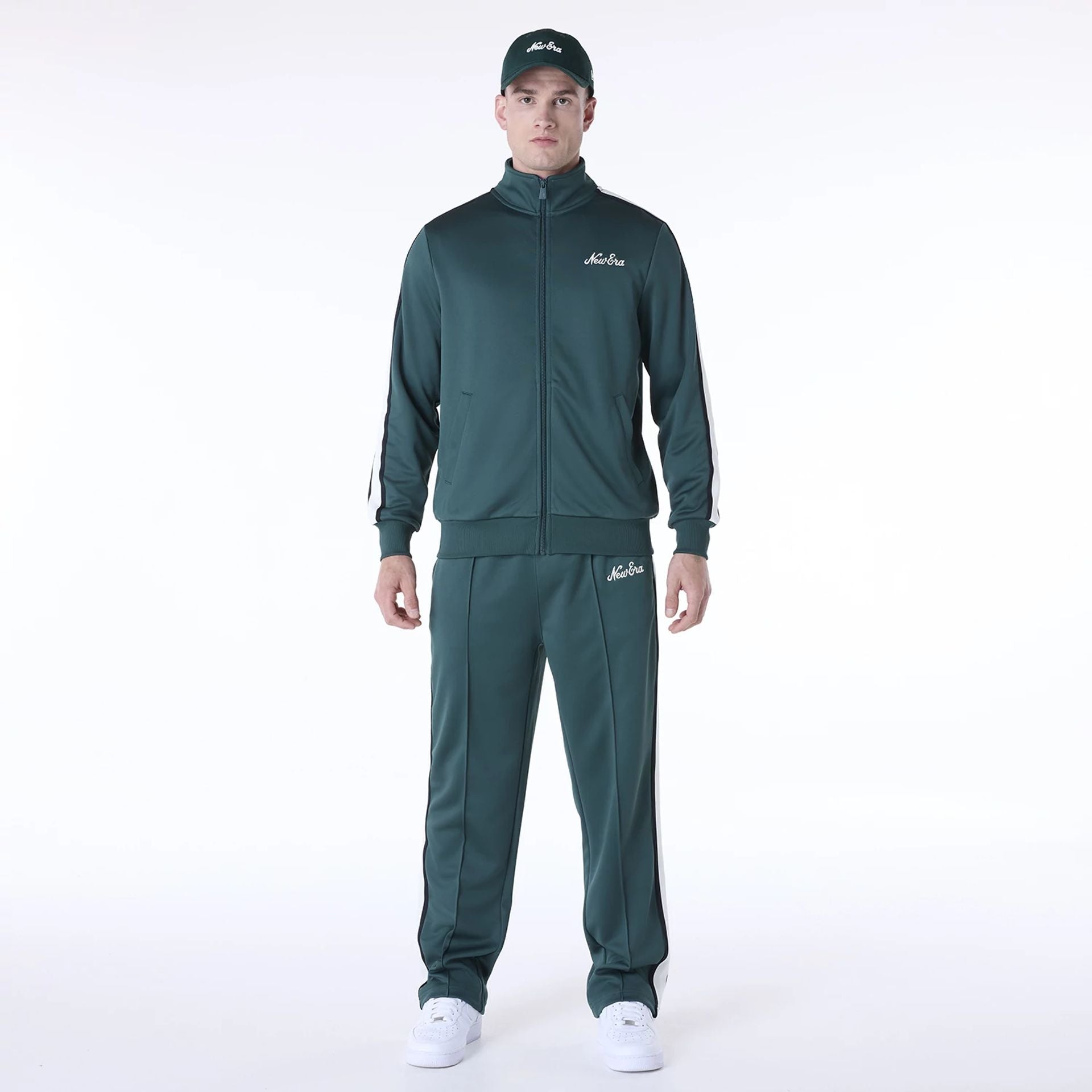 The Male model is wearing New Era Essential Dark Green Track Pants 8