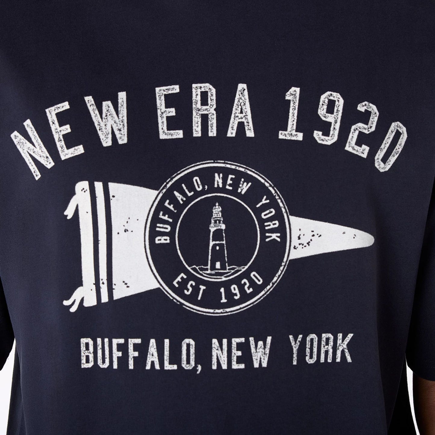 The Male model is wearing New Era Graphic Navy Oversized T-Shirt 6