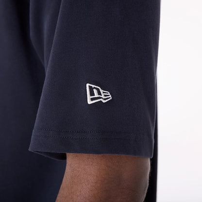 The Male model is wearing New Era Graphic Navy Oversized T-Shirt 7