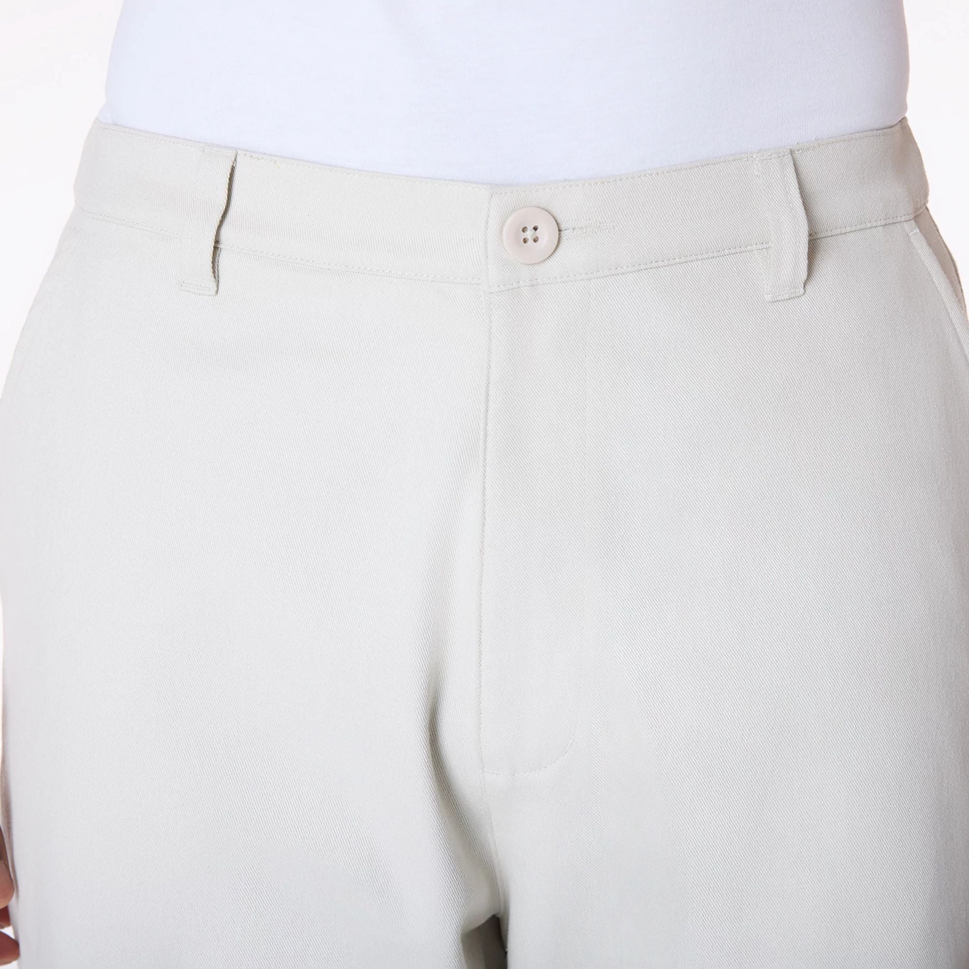 The Male model is wearing New Era Cream Chino Trousers 7