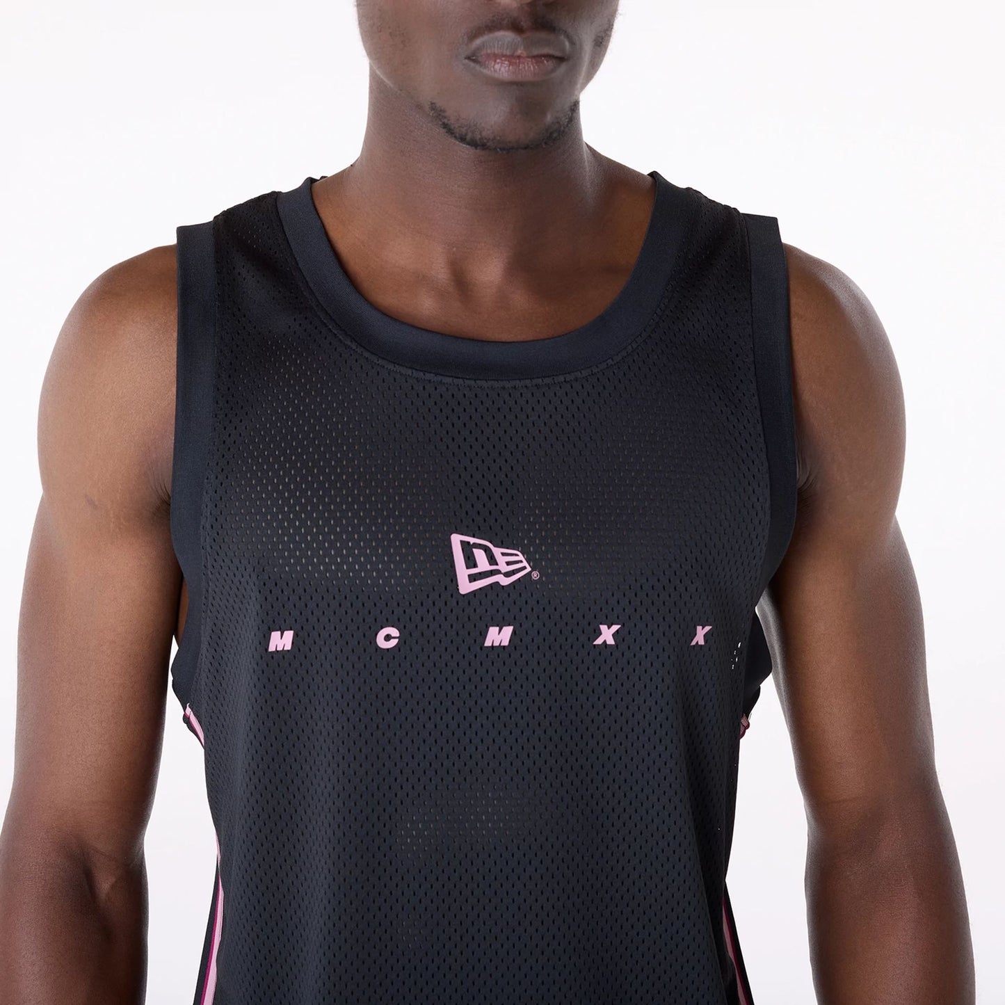 The Male model is wearing New Era Mesh Black Vest 3