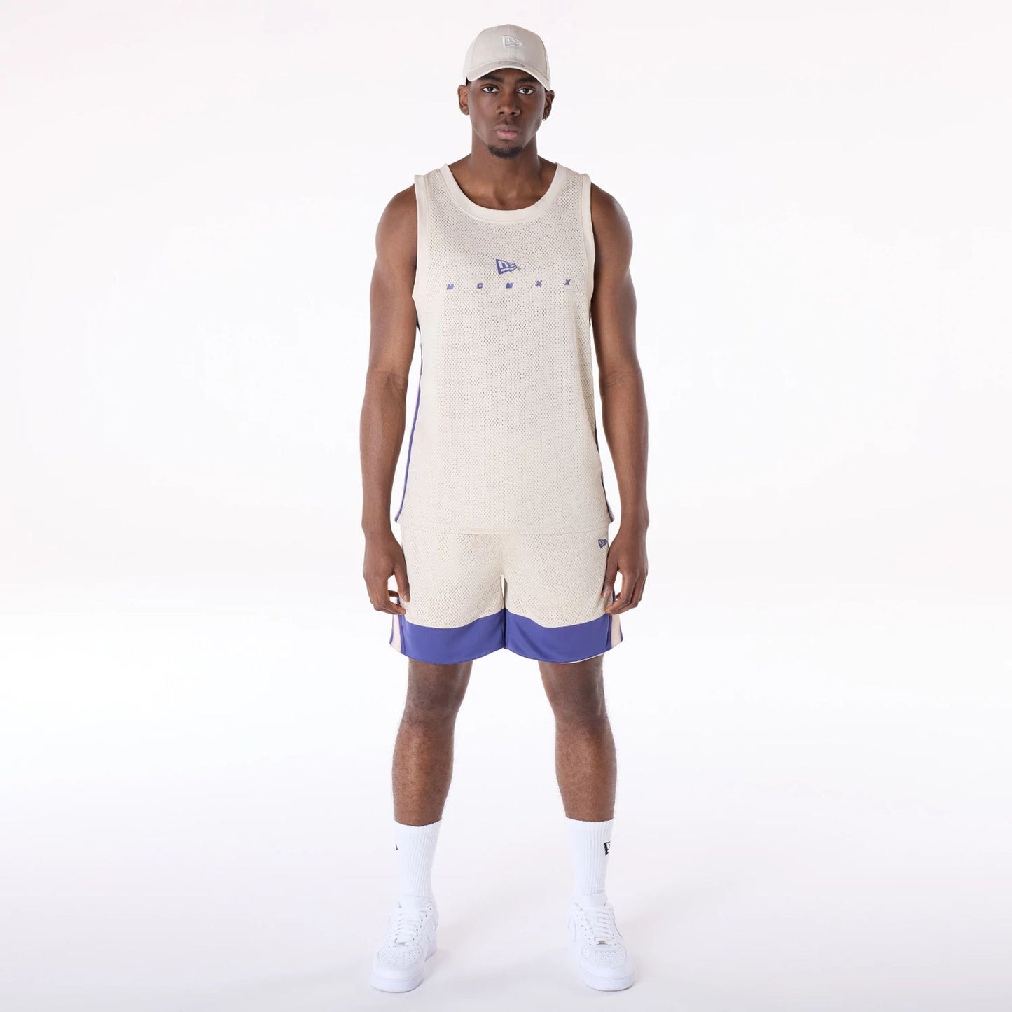 The Male model is wearing New Era Mesh Light Beige Vest 5