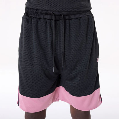 The Male model is wearing New Era Mesh Black Oversized Shorts 3