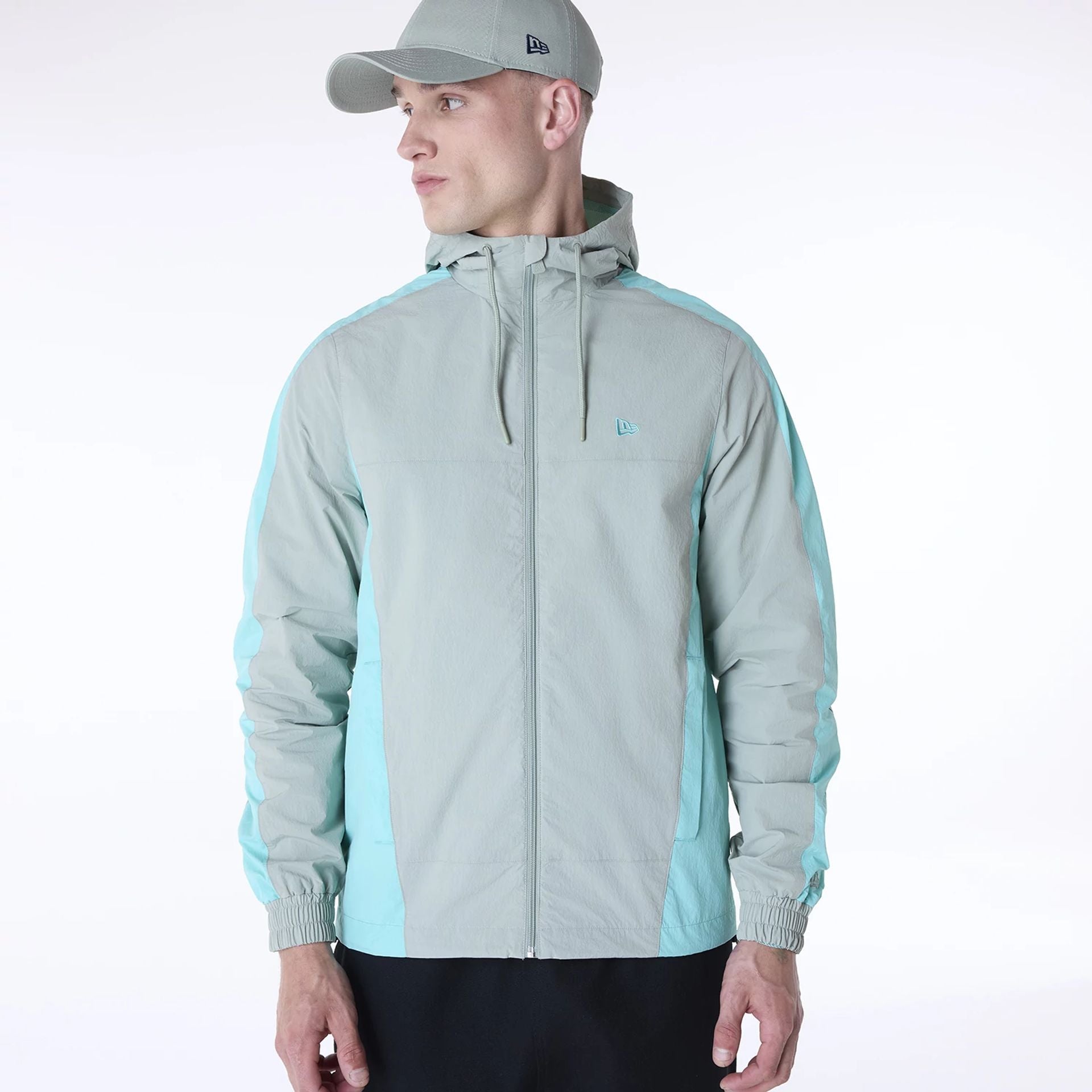 The Male model is wearing New Era Colour Block Pastel Green Jacket 4