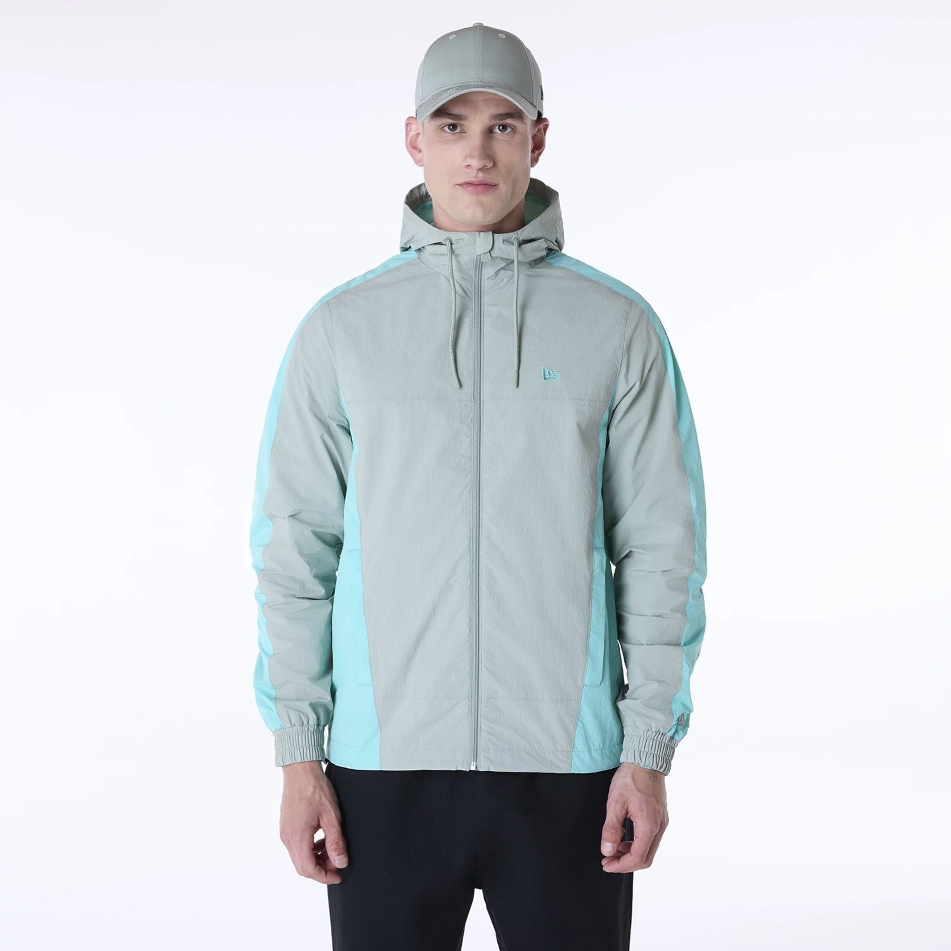 The Male model is wearing New Era Colour Block Pastel Green Jacket 1