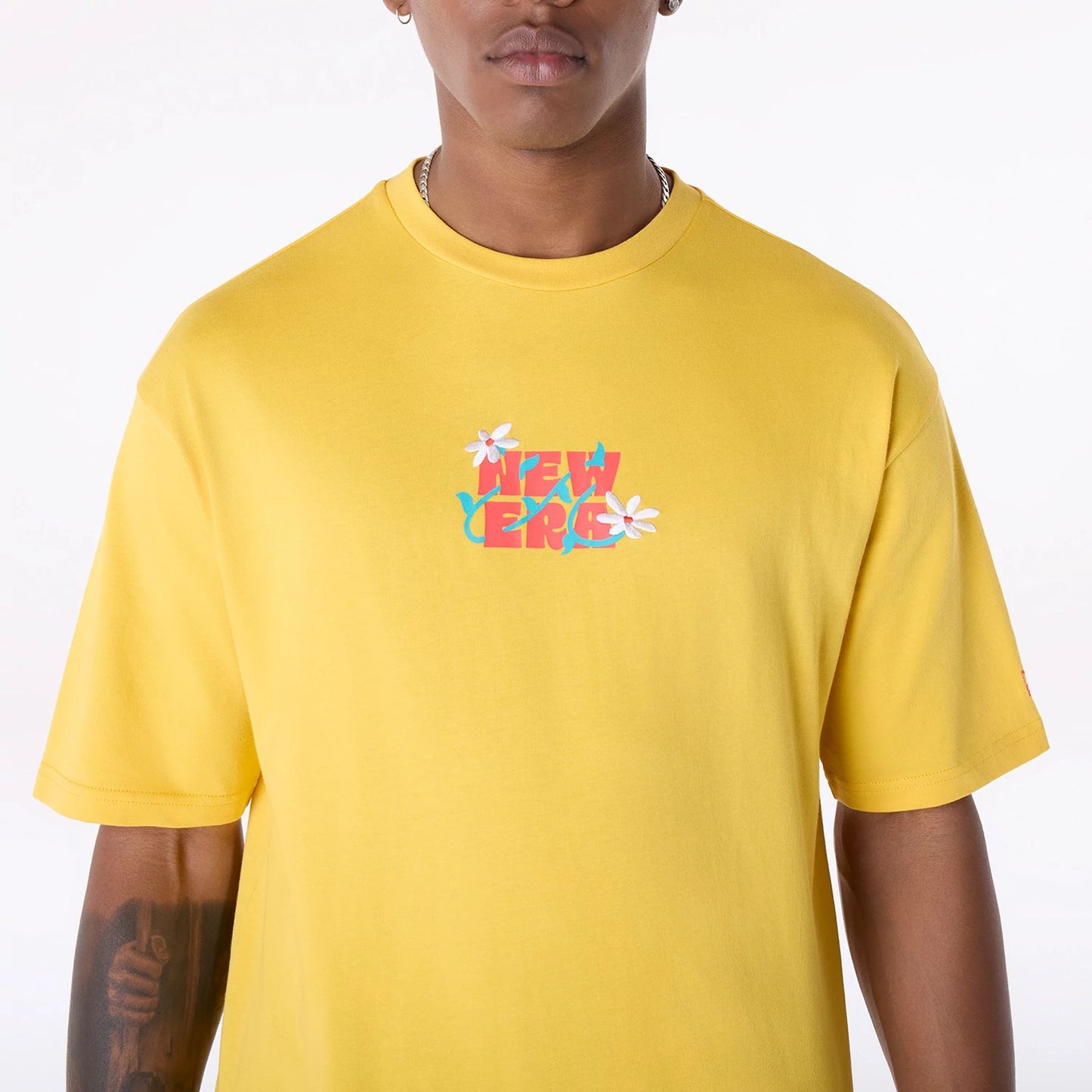 The Male model is wearing New Era Drink Graphic Yellow Oversized T-Shirt 7