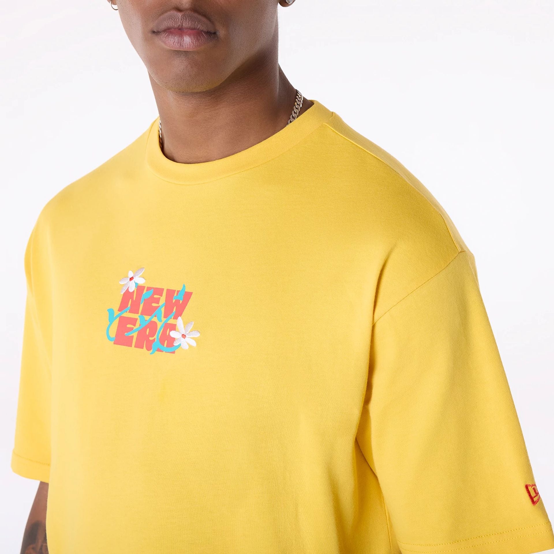 The Male model is wearing New Era Drink Graphic Yellow Oversized T-Shirt 5