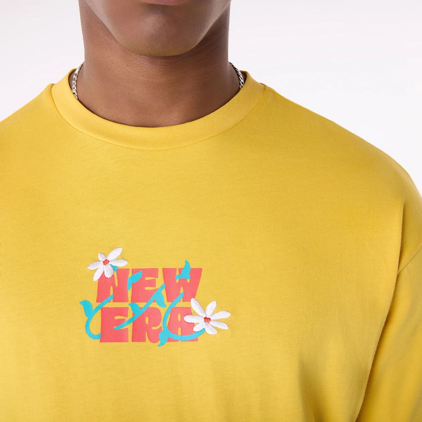 The Male model is wearing New Era Drink Graphic Yellow Oversized T-Shirt 3