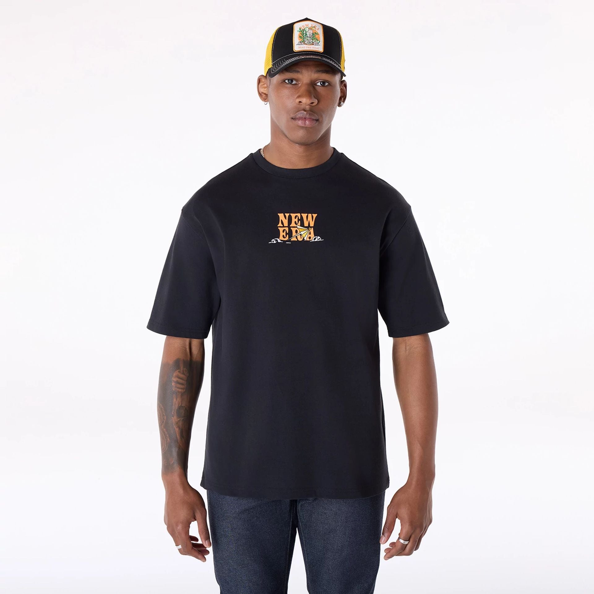 The Male model is wearing New Era Drink Graphic Black Oversized T-Shirt 4