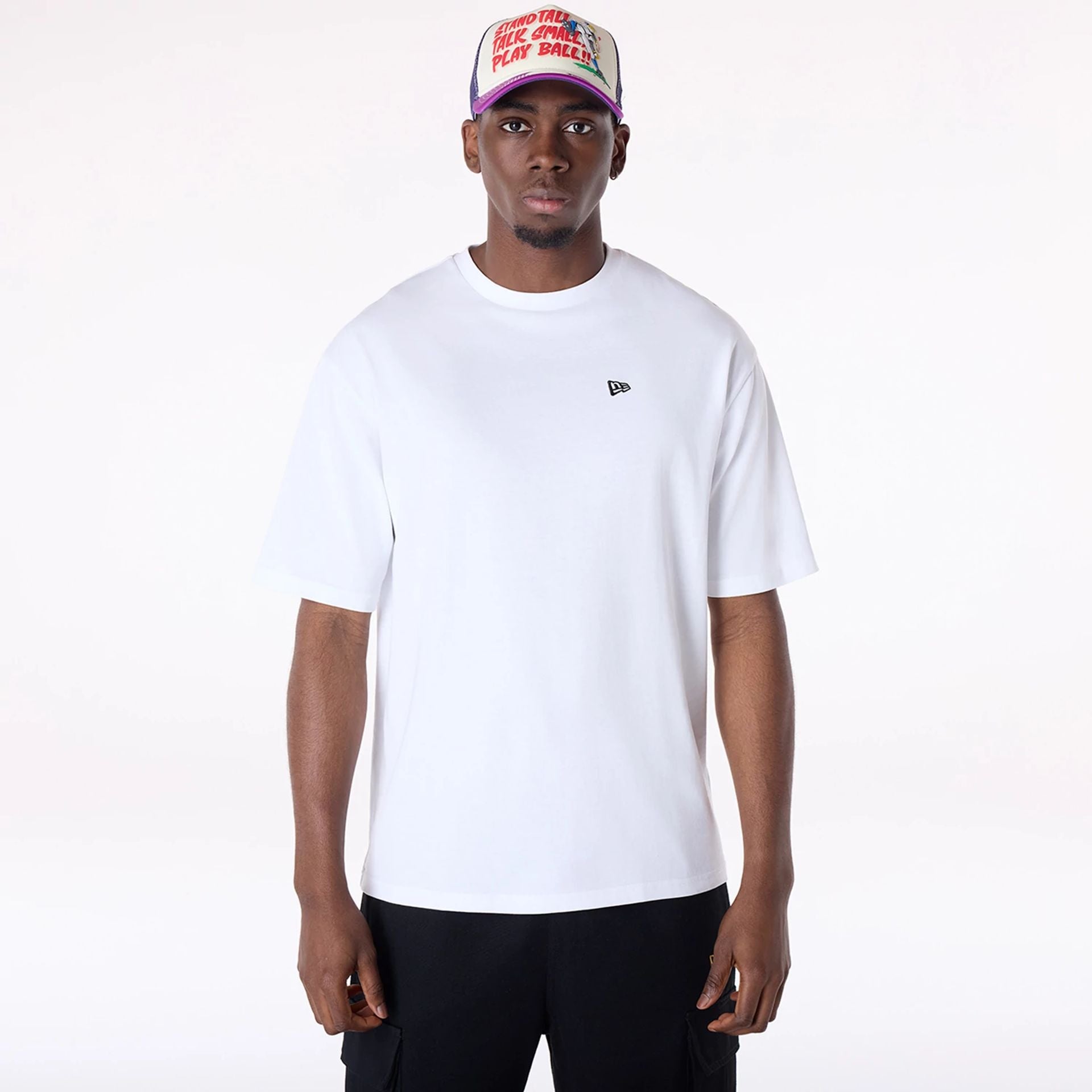 The Male model is wearing New Era Baseball Graphic White Oversized T-Shirt 1