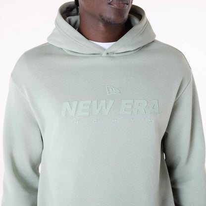 The Male model is wearing New Era Flag Pastel Green Oversized Pullover Hoodie 3