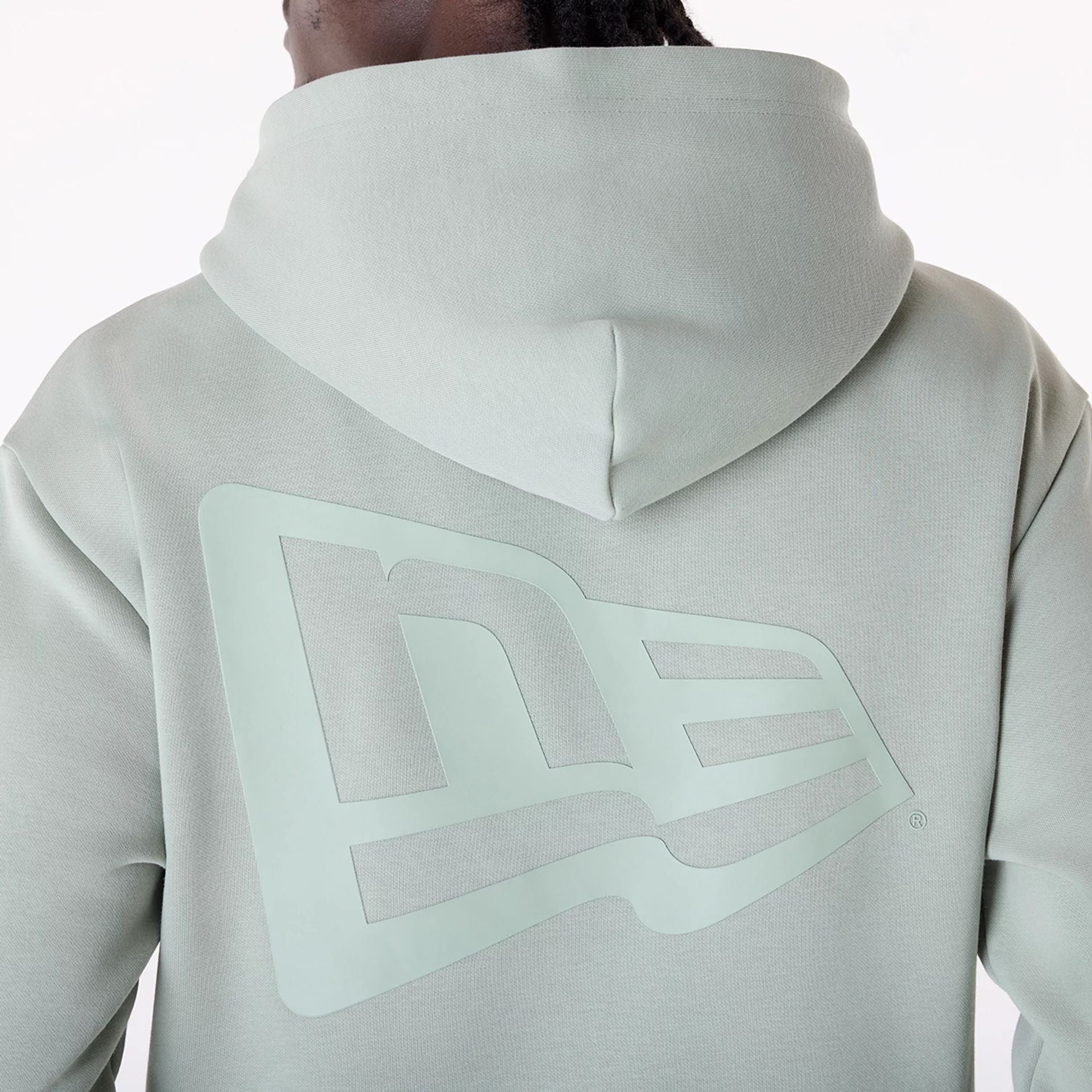 The Male model is wearing New Era Flag Pastel Green Oversized Pullover Hoodie 4