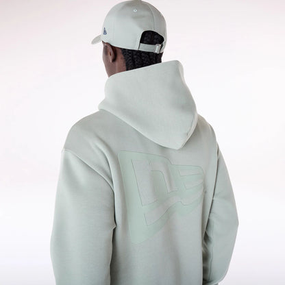 The Male model is wearing New Era Flag Pastel Green Oversized Pullover Hoodie 7