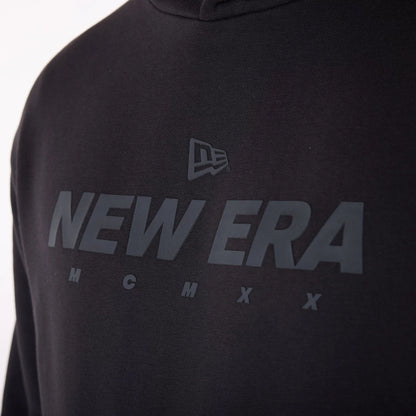 The Male model is wearing New Era Flag Black Oversized Pullover Hoodie 6