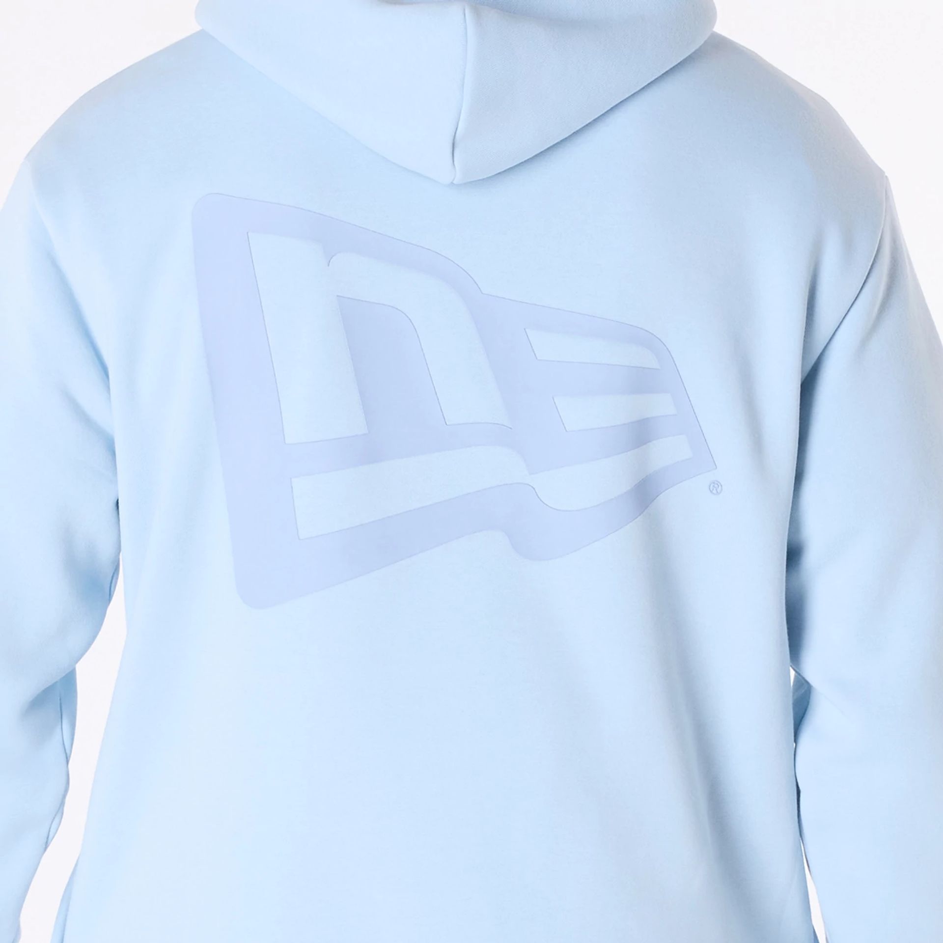 The Male model is wearing New Era Flag Pastel Blue Oversized Pullover Hoodie 8