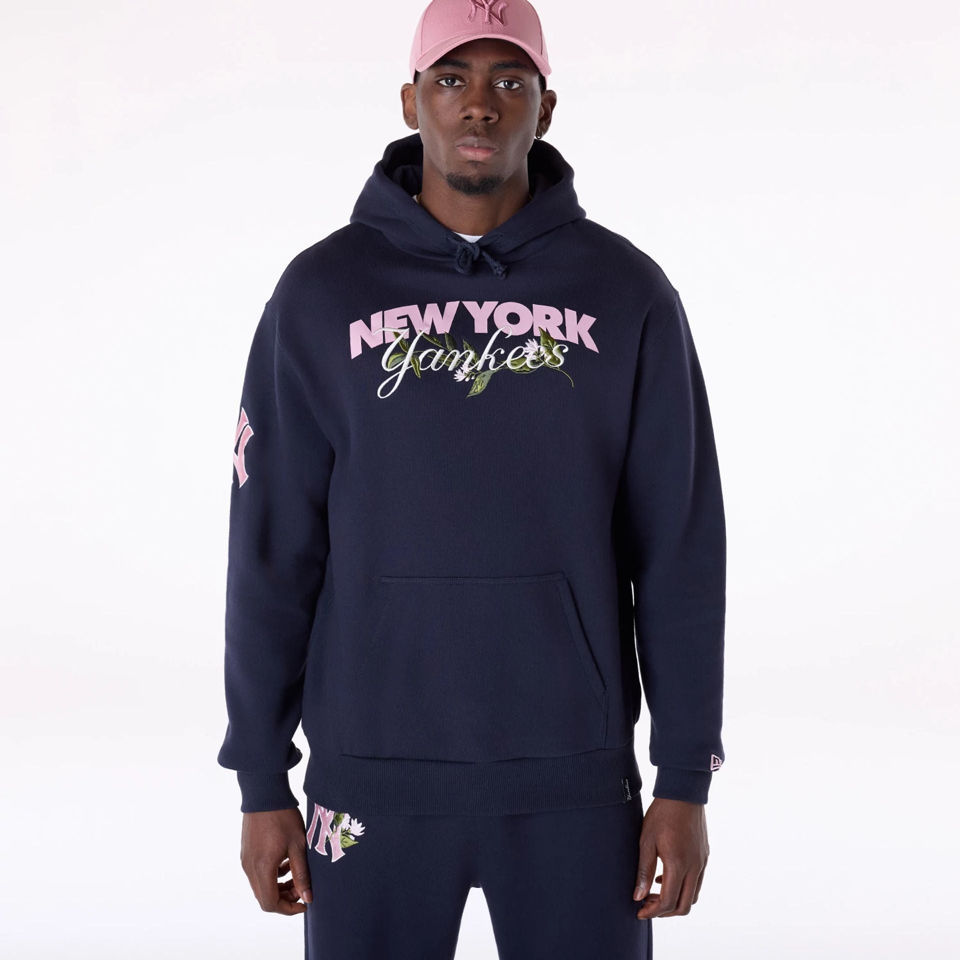 The Male model is wearing New York Yankees MLB Floral Navy Pullover Hoodie 1