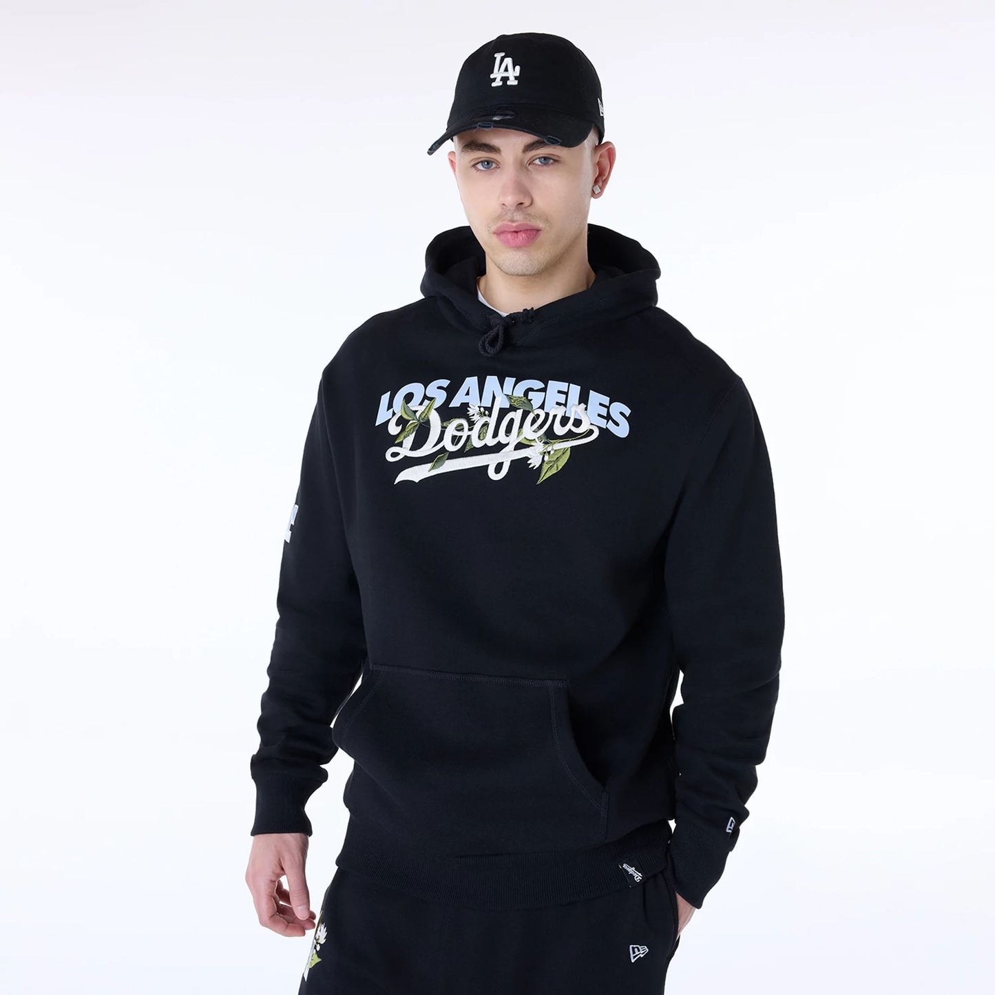 The Male model is wearing LA Dodgers MLB Floral Black Pullover Hoodie 3