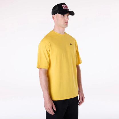 The Male model is wearing New Era Baseball Graphic Yellow Oversized T-Shirt 7