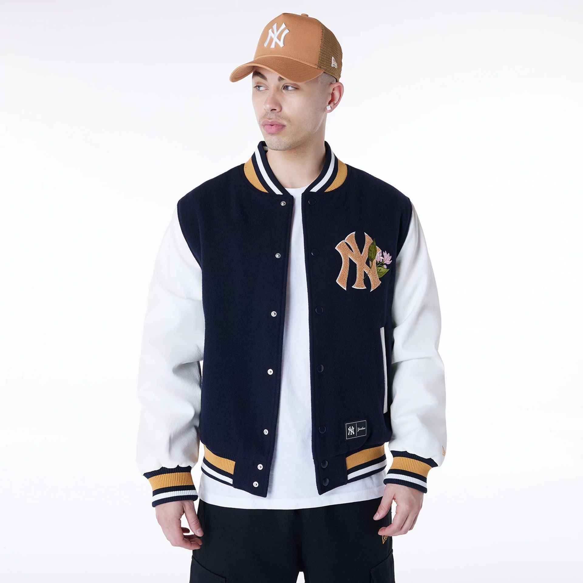 The Male model is wearing New York Yankees MLB Floral Navy Jacket 1