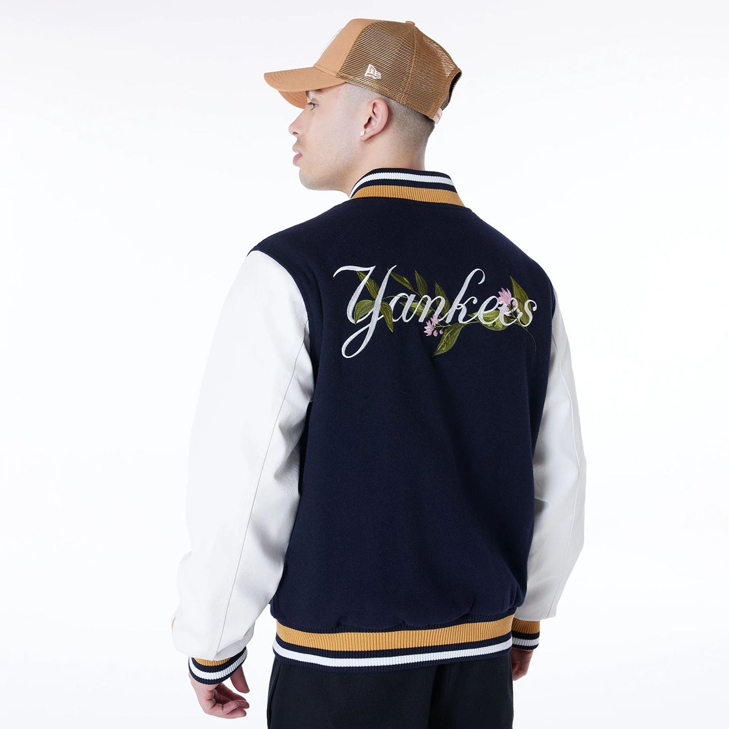 The Male model is wearing New York Yankees MLB Floral Navy Jacket 2