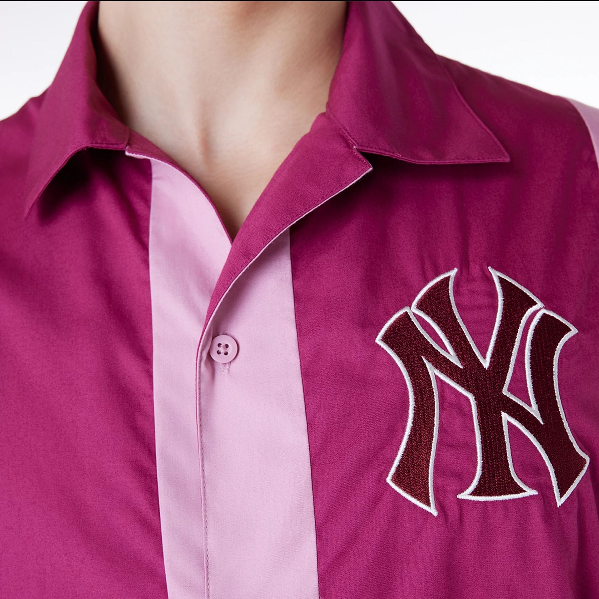 The Male model is wearing New York Yankees Stripe Revere Dark Pink Short Sleeve Shirt 7