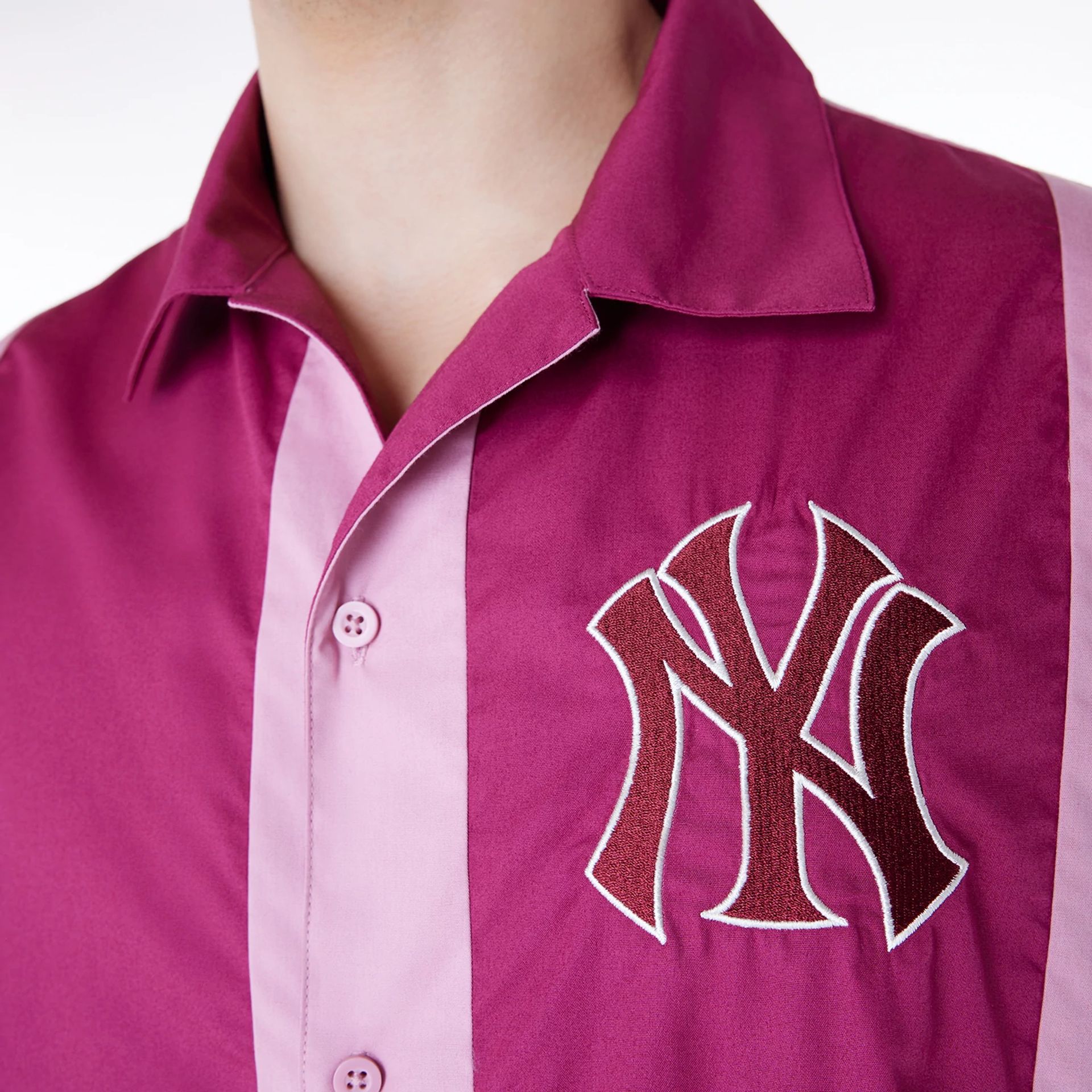 The Male model is wearing New York Yankees Stripe Revere Dark Pink Short Sleeve Shirt 4