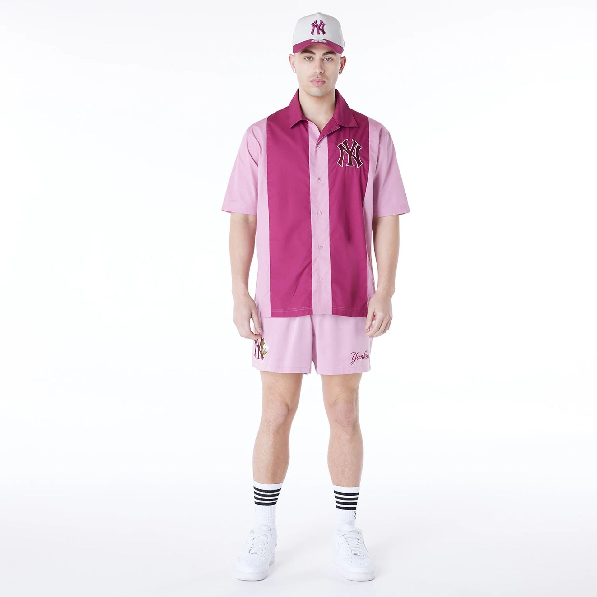 The Male model is wearing New York Yankees Stripe Revere Dark Pink Short Sleeve Shirt 3