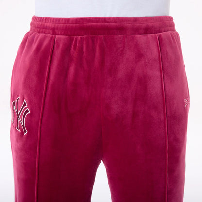 The Male model is wearing New York Yankees MLB Velour Dark Red Joggers 7