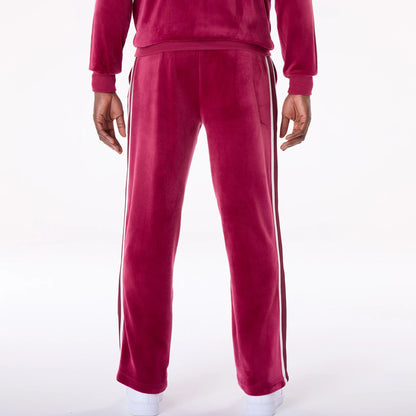 The Male model is wearing New York Yankees MLB Velour Dark Red Joggers 2