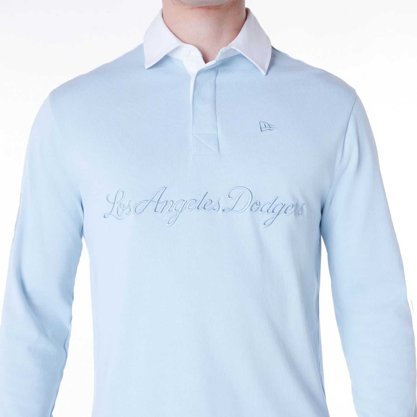 The Male model is wearing LA Dodgers MLB Script Pastel Blue Long Sleeve Polo 3