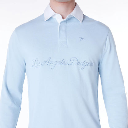 The Male model is wearing LA Dodgers MLB Script Pastel Blue Long Sleeve Polo 3