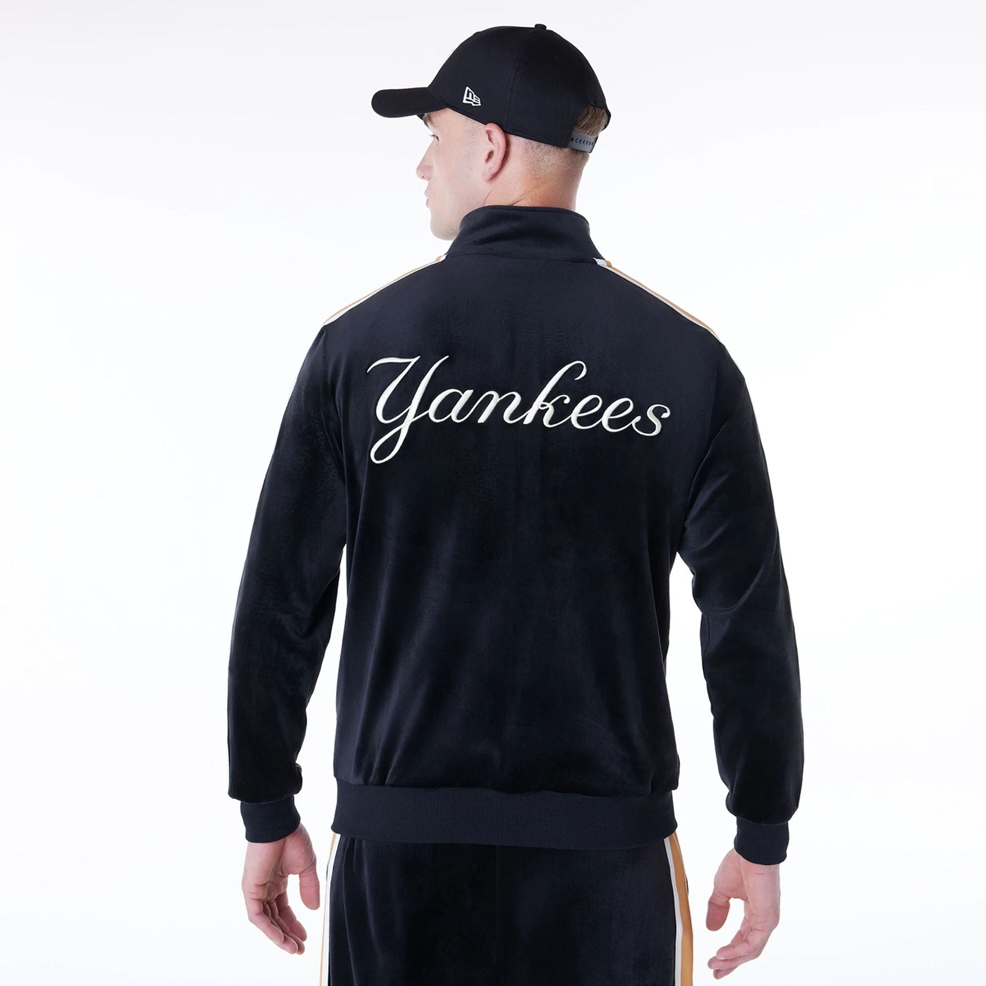 The Male model is wearing New York Yankees MLB Velour Black Track Jacket 2