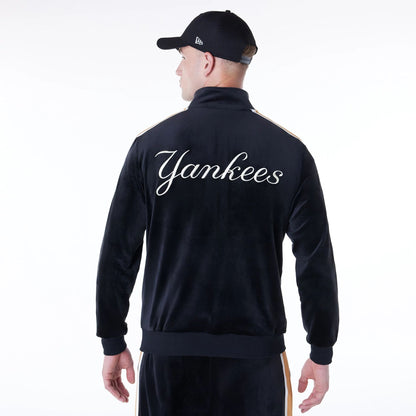 The Male model is wearing New York Yankees MLB Velour Black Track Jacket 2