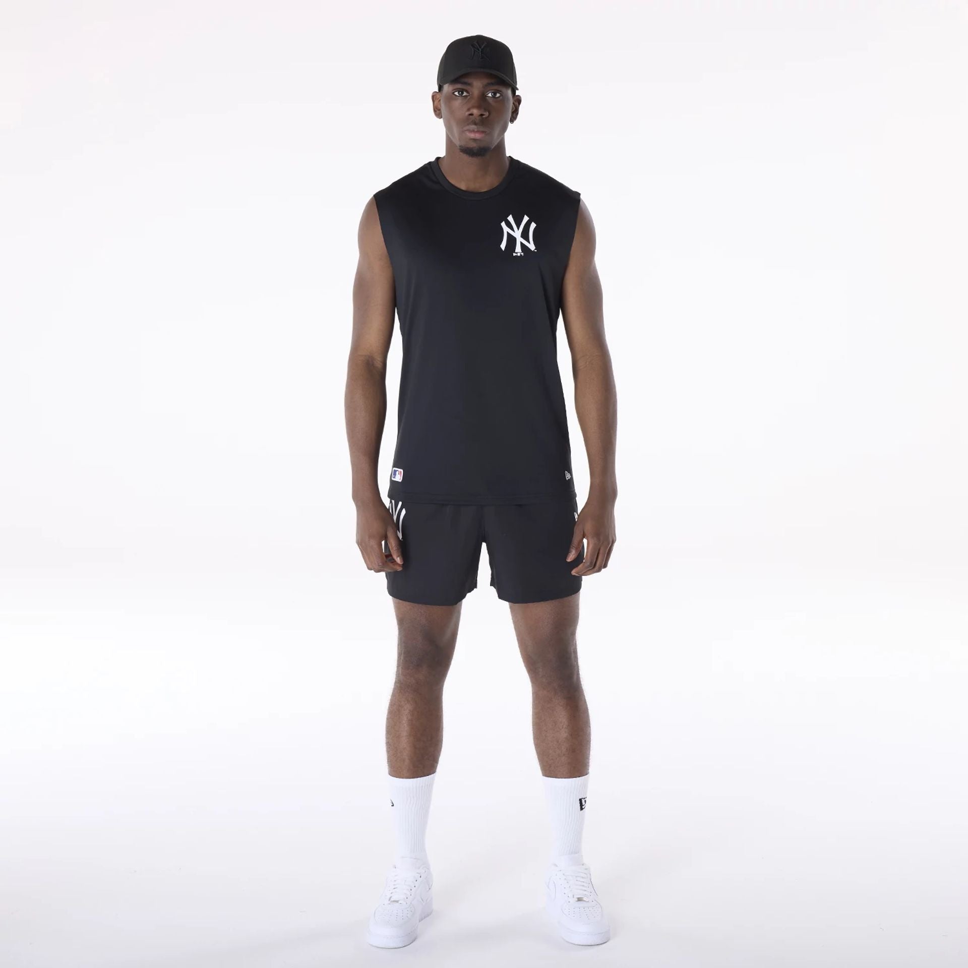 The Male model is wearing New York Yankees MLB Black Sleeveless Vest 4