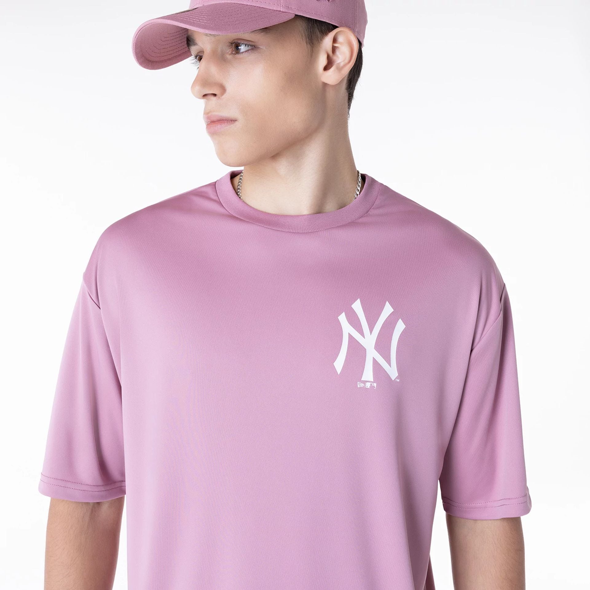 The Male model is wearing New York Yankees League Essential Dark Pink T-Shirt 7