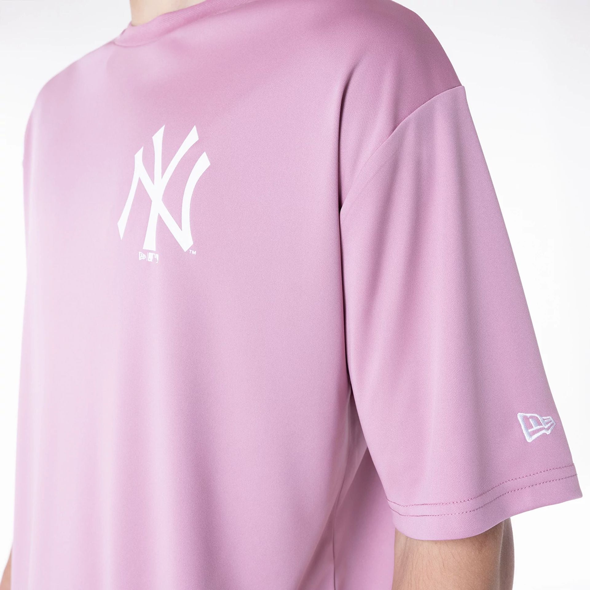 The Male model is wearing New York Yankees League Essential Dark Pink T-Shirt 3