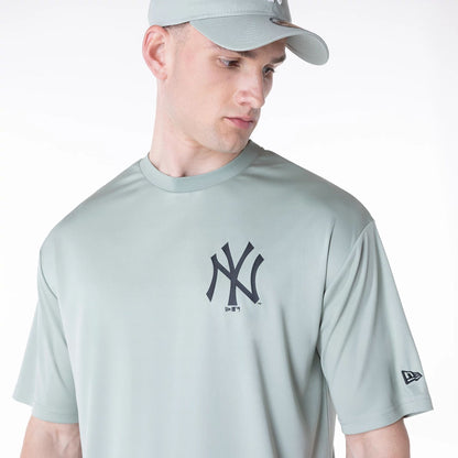 The Male model is wearing New York Yankees League Essential Pastel Green T-Shirt 6