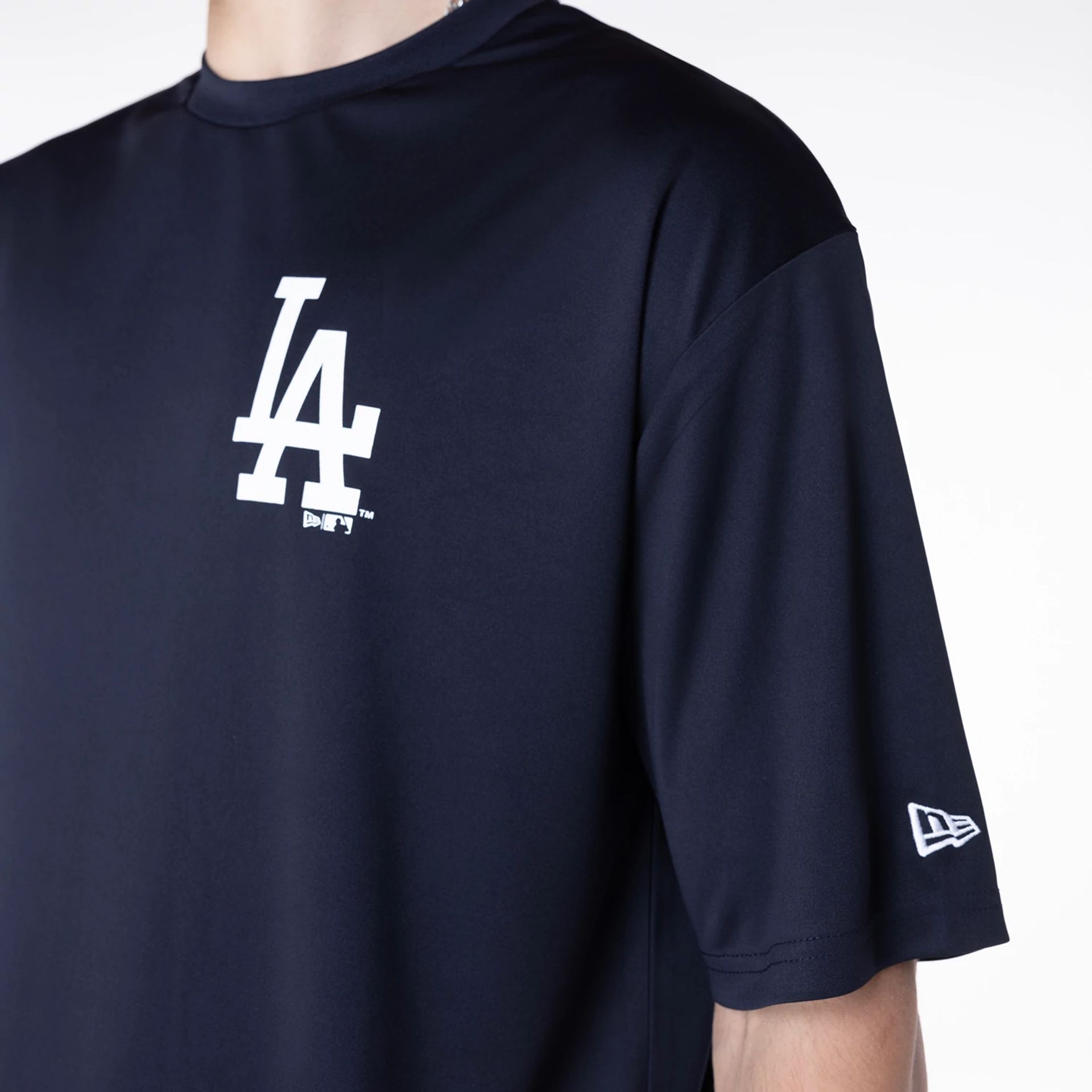 The Male model is wearing LA Dodgers League Essential Navy T-Shirt 8